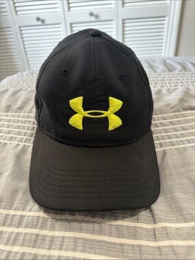 Under Armour Black Hat with Yellow Logo from Harmony Golf Club